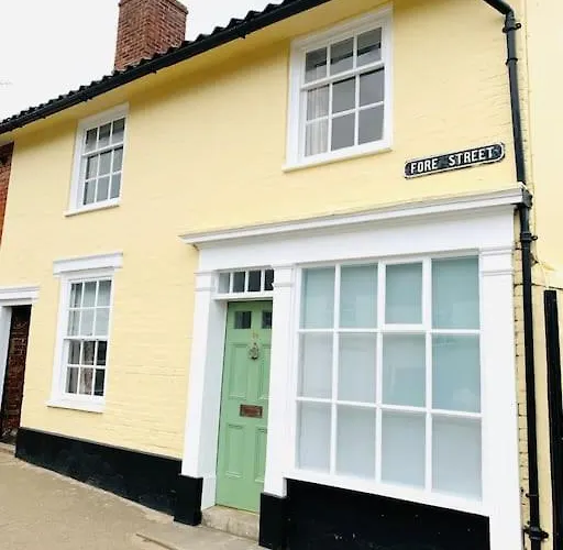 The Yellow Cottage On The Hill.